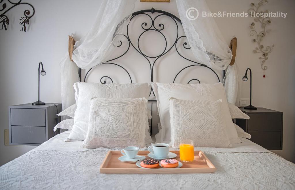 Giường trong phòng chung tại Civico 46