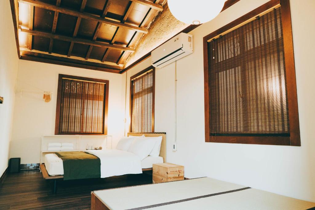 Postel nebo postele na pokoji v ubytování Goonnight Hostel