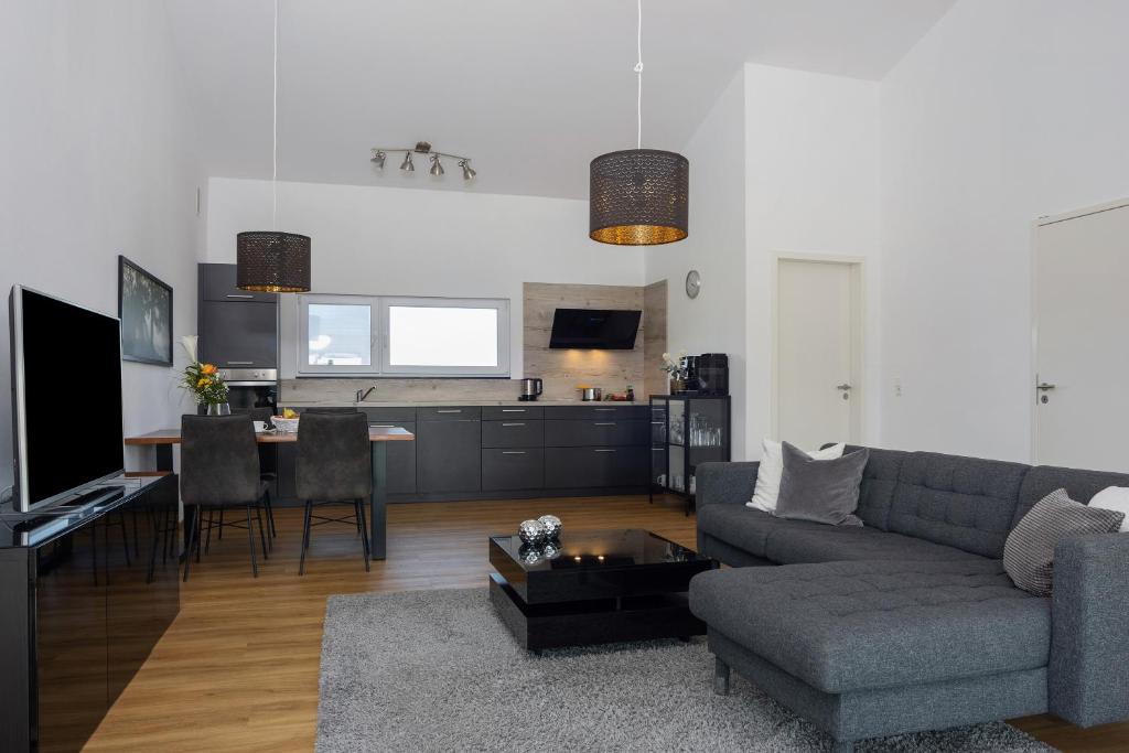 TV a/nebo společenská místnost v ubytování Chalet Am Ried