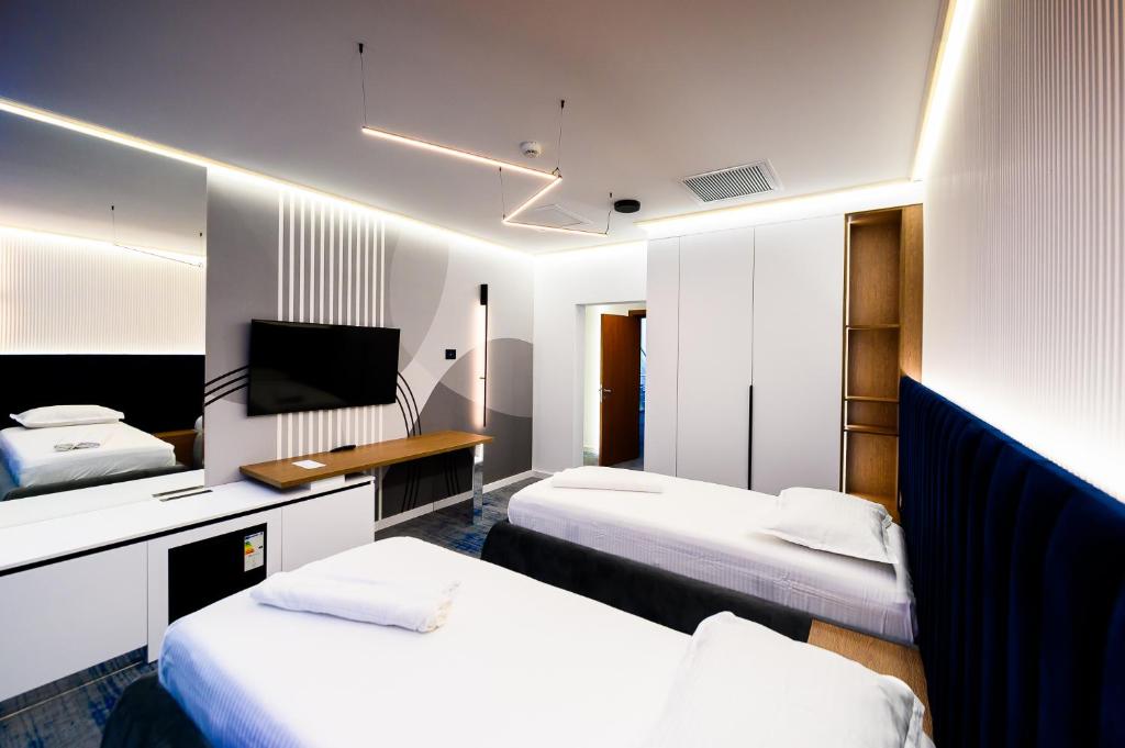 Postel nebo postele na pokoji v ubytování Hotel Bavaria
