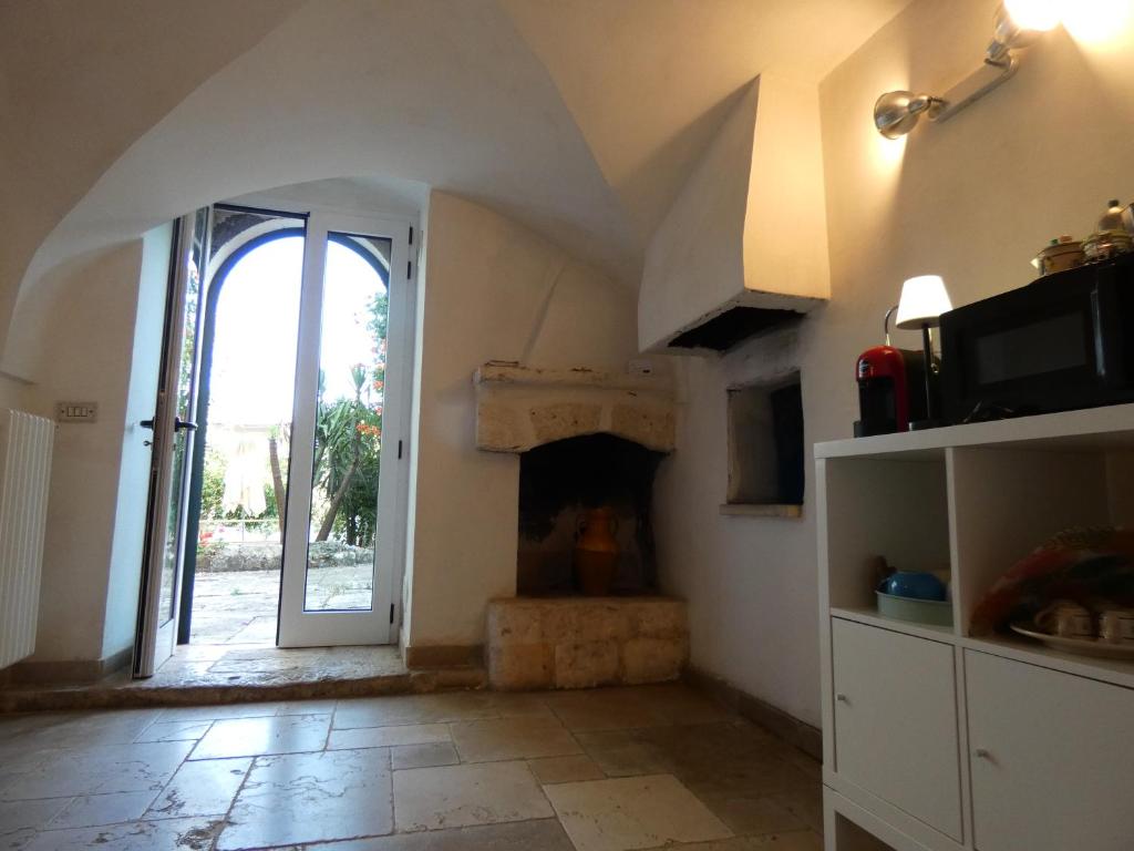 Telewizja i/lub zestaw kina domowego w obiekcie Villa Miccoli apartments