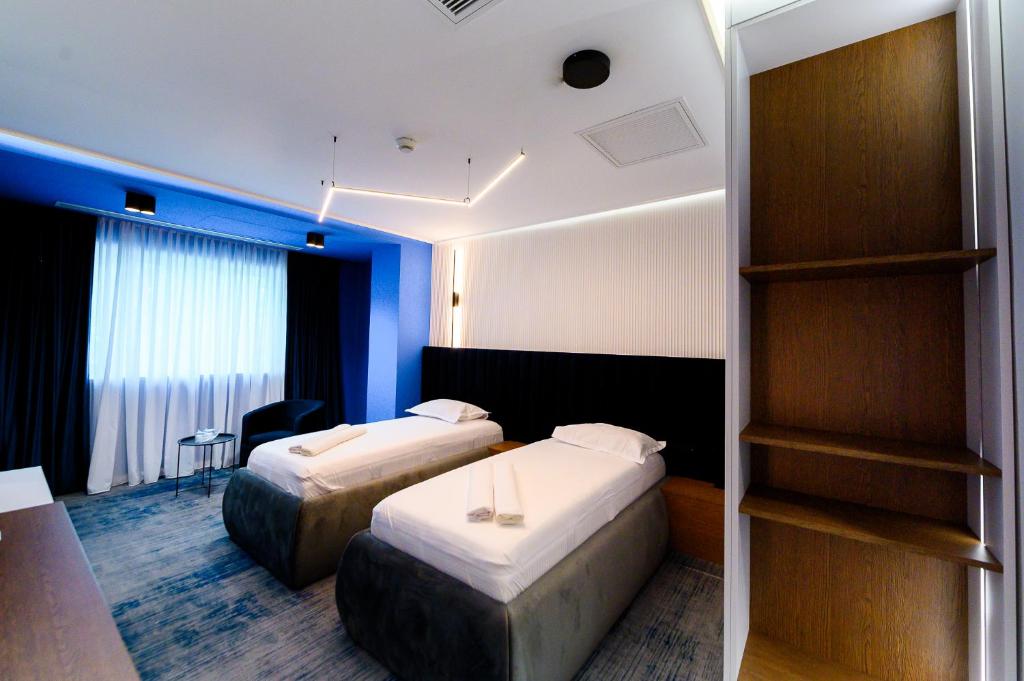 Postel nebo postele na pokoji v ubytování Hotel Bavaria