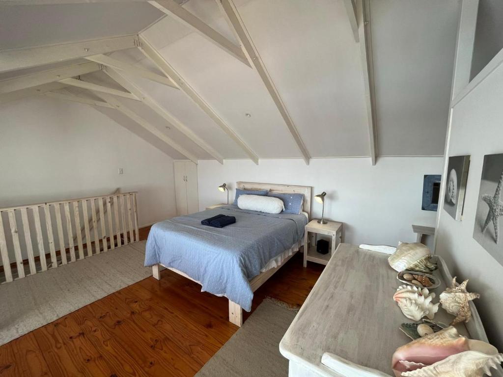 Postel nebo postele na pokoji v ubytování Beachfront Bliss