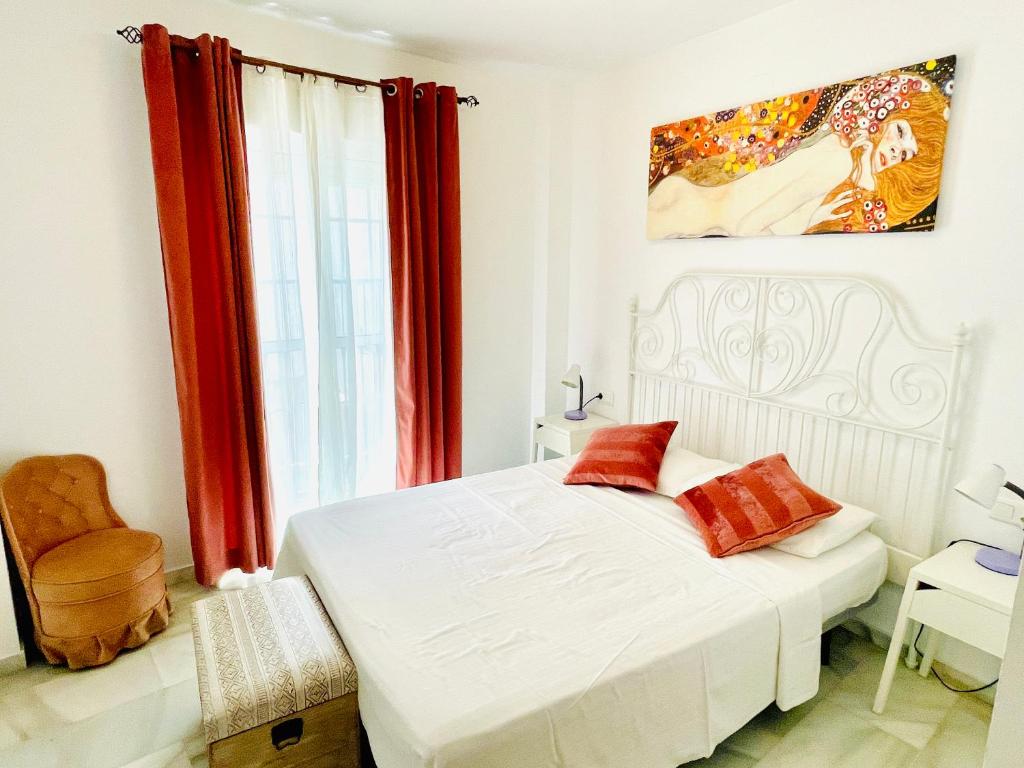 Postel nebo postele na pokoji v ubytování La Pimentera Central Apartments 4 - Centro Historico