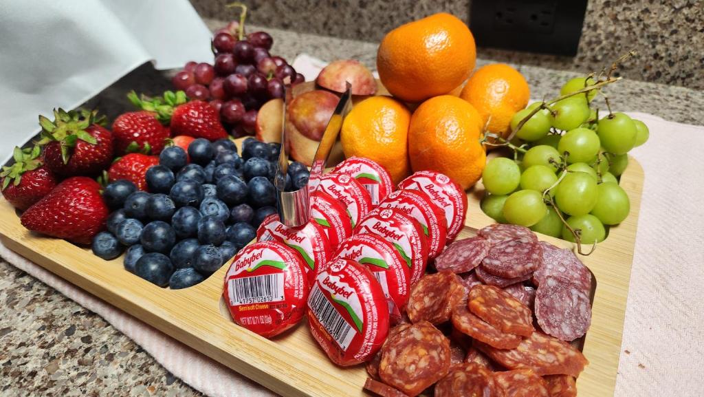 a tray of fruits and nuts on a table at Big Creek Inn in Fish Camp