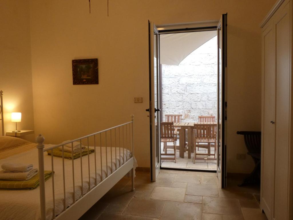 Łóżko lub łóżka w pokoju w obiekcie Villa Miccoli apartments