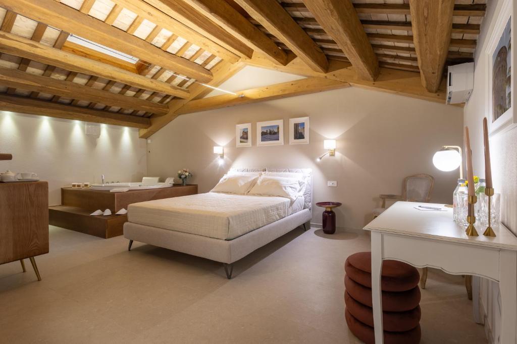 Postel nebo postele na pokoji v ubytování Palazzo Anelli - Rooms & Relax
