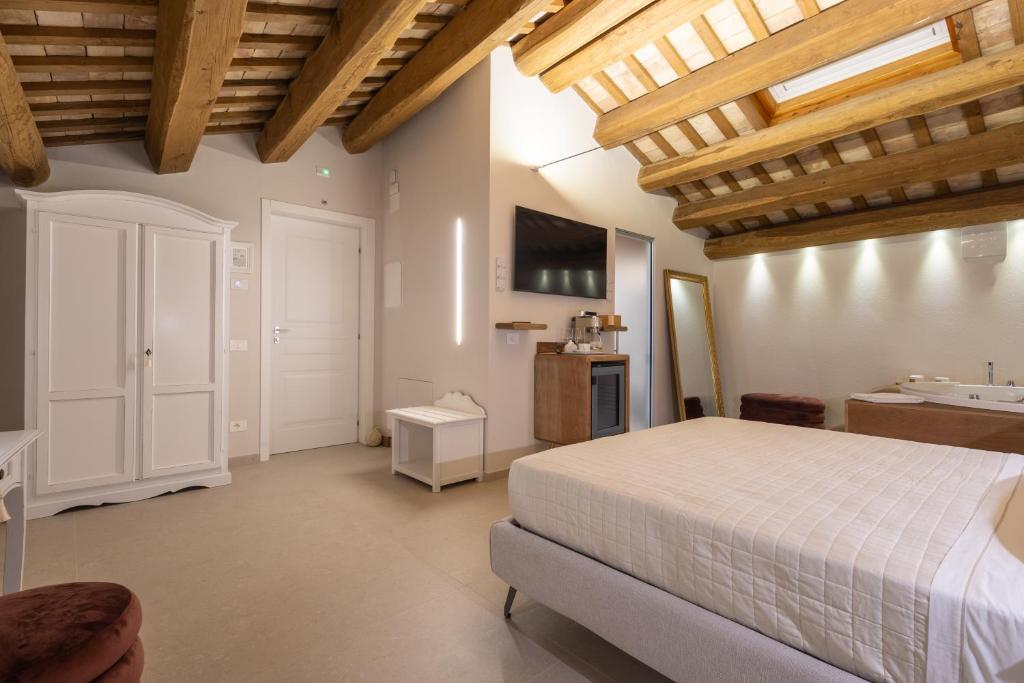 Postel nebo postele na pokoji v ubytování Palazzo Anelli - Rooms & Relax