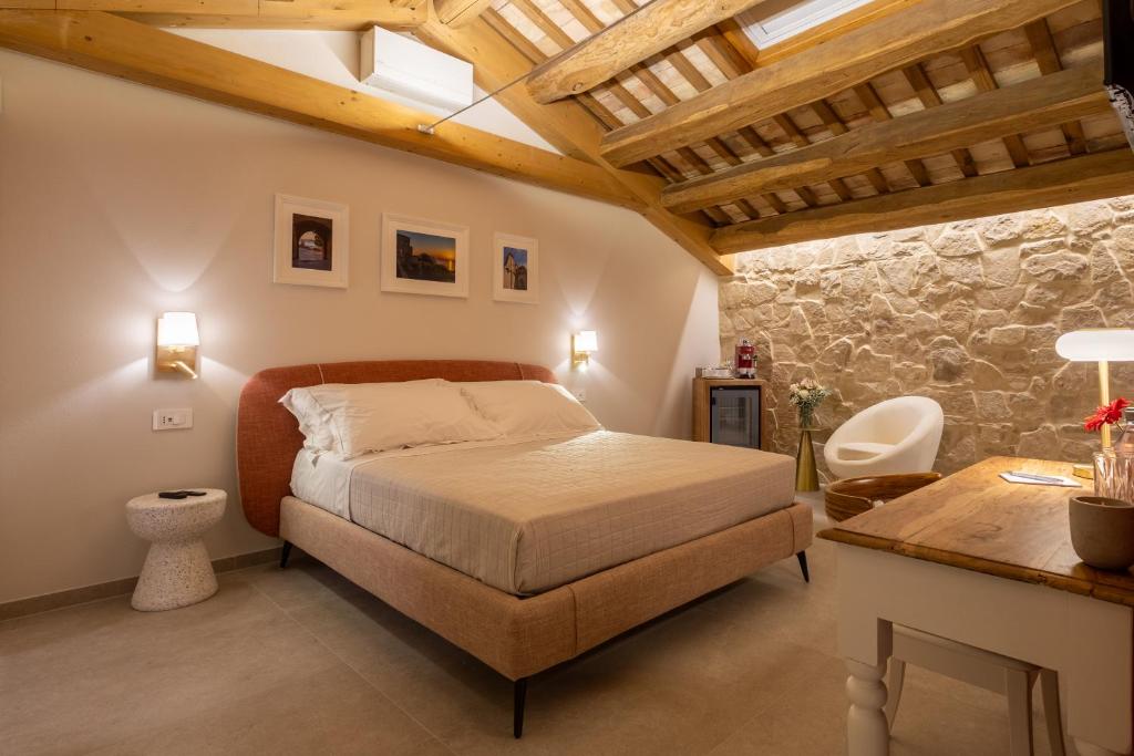 Postel nebo postele na pokoji v ubytování Palazzo Anelli - Rooms & Relax