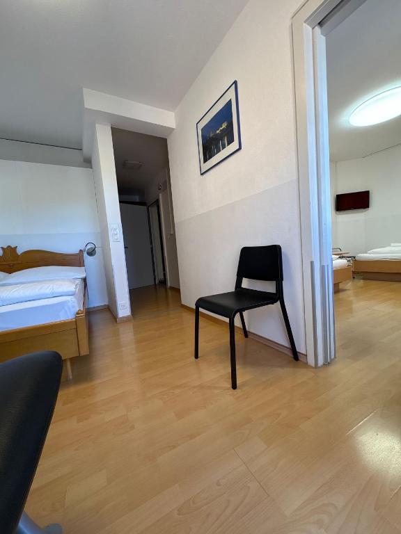 Postel nebo postele na pokoji v ubytování Hotel Rheinfall