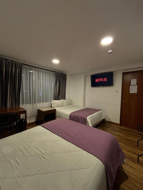 Postel nebo postele na pokoji v ubytování HOTEL COMFORT- Inn