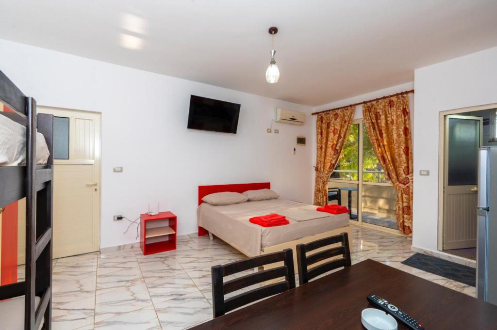 TV in/ali zabaviščno središče v nastanitvi Hotel Otrant