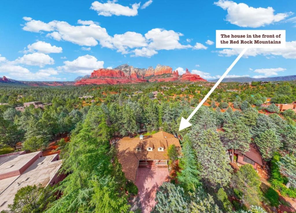 an image of a house in the foreground of las hadel mountains at Spacious 3BR Yavapai Retreat with Nature Views, Hot Tub and Game Room in Sedona