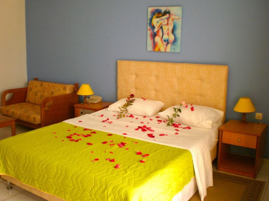 Voodi või voodid majutusasutuse Hotel Oasis toas