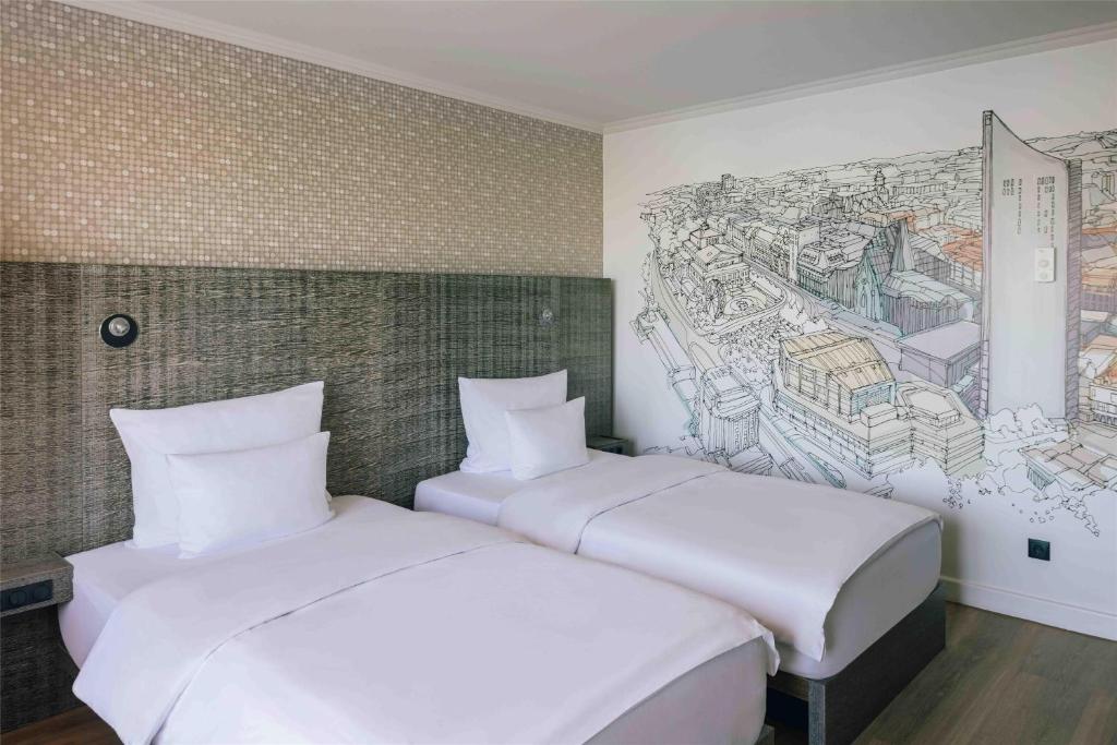 Pentahotel Leipzig - Resim 11