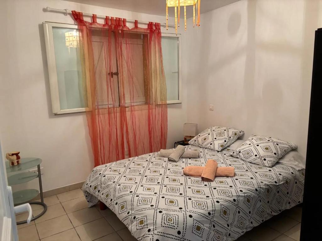 Posteľ alebo postele v izbe v ubytovaní Maison de charme à Ajaccio avec terrasse et jardin