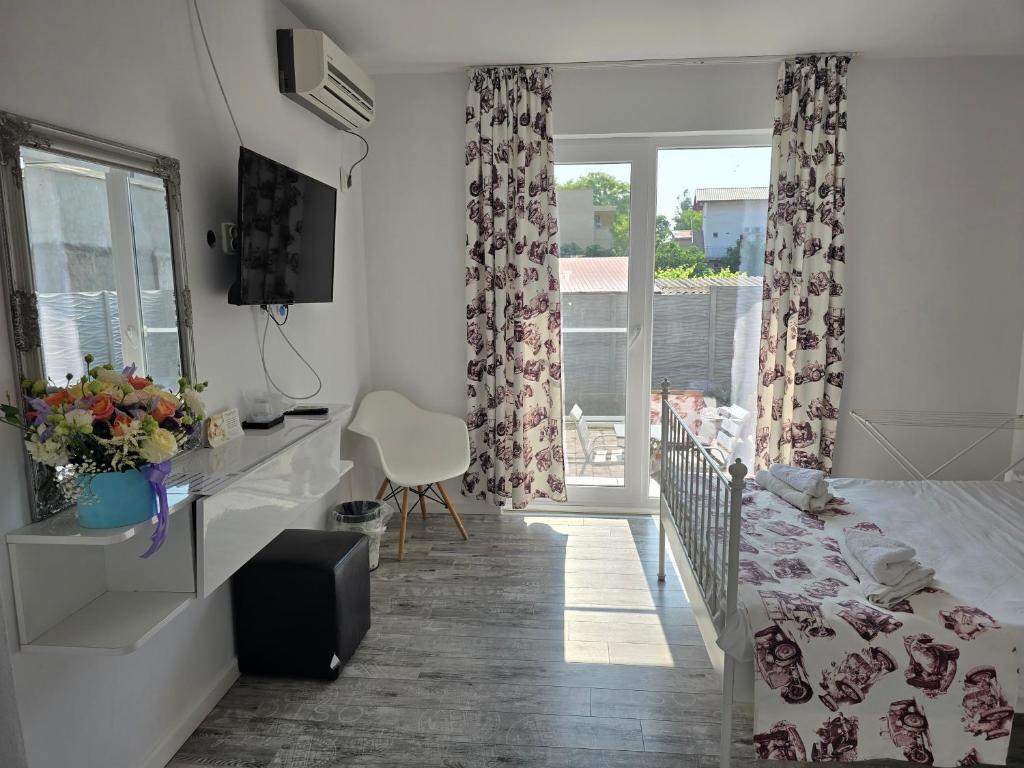 Postel nebo postele na pokoji v ubytování Anacris Guesthouse