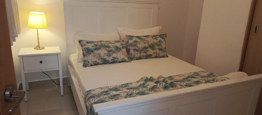 Postel nebo postele na pokoji v ubytování Apartamento en Boca Chica T2 611