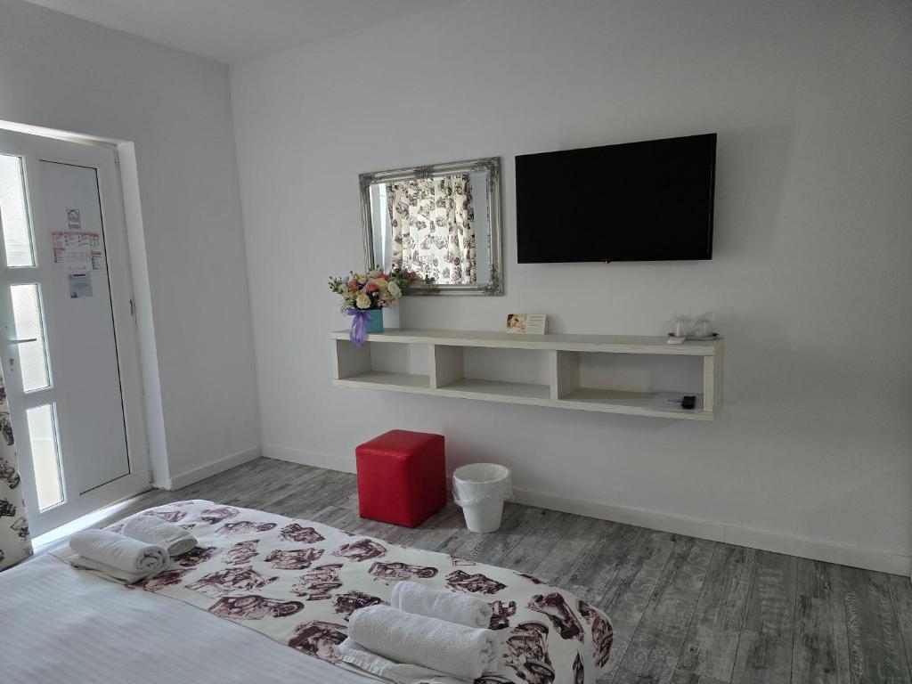 TV a/nebo společenská místnost v ubytování Anacris Guesthouse