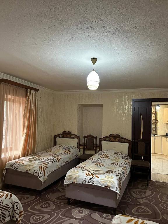 Postel nebo postele na pokoji v ubytování Lucy B&B