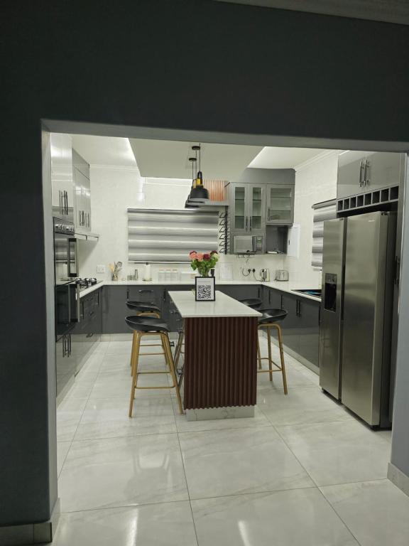 Kuchyň nebo kuchyňský kout v ubytování Stegor Suites