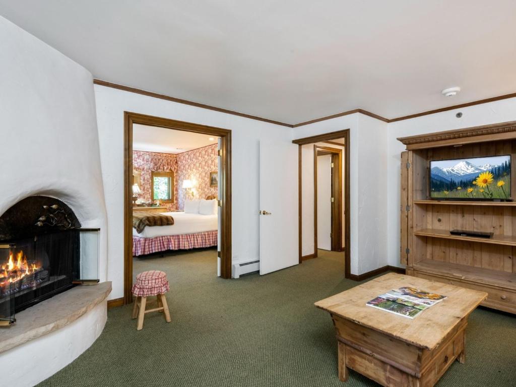 Postel nebo postele na pokoji v ubytování Christiania Lodge