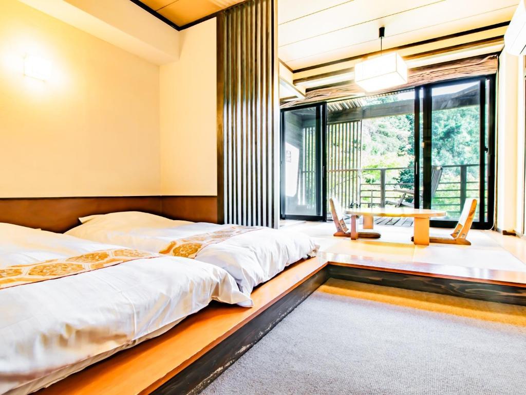 Katil atau katil-katil dalam bilik di Kirishima Momijidani Seiryuso - Vacation STAY 63056v