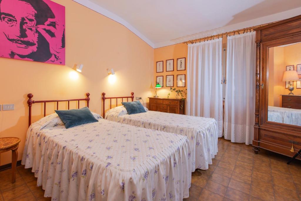 Postel nebo postele na pokoji v ubytování Albergo La Felicina - Mugello