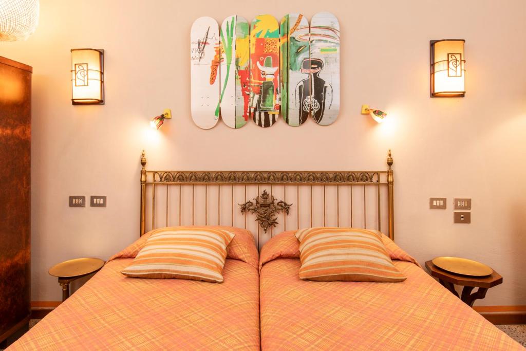 Postel nebo postele na pokoji v ubytování Albergo La Felicina - Mugello