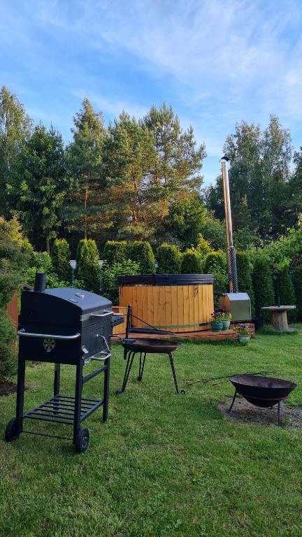Vonkajšia záhrada v ubytovaní Trasą S7 w 2h z Warszawy i Gdanska, Jadamowo holidaymazury, jacuzzi, jezioro