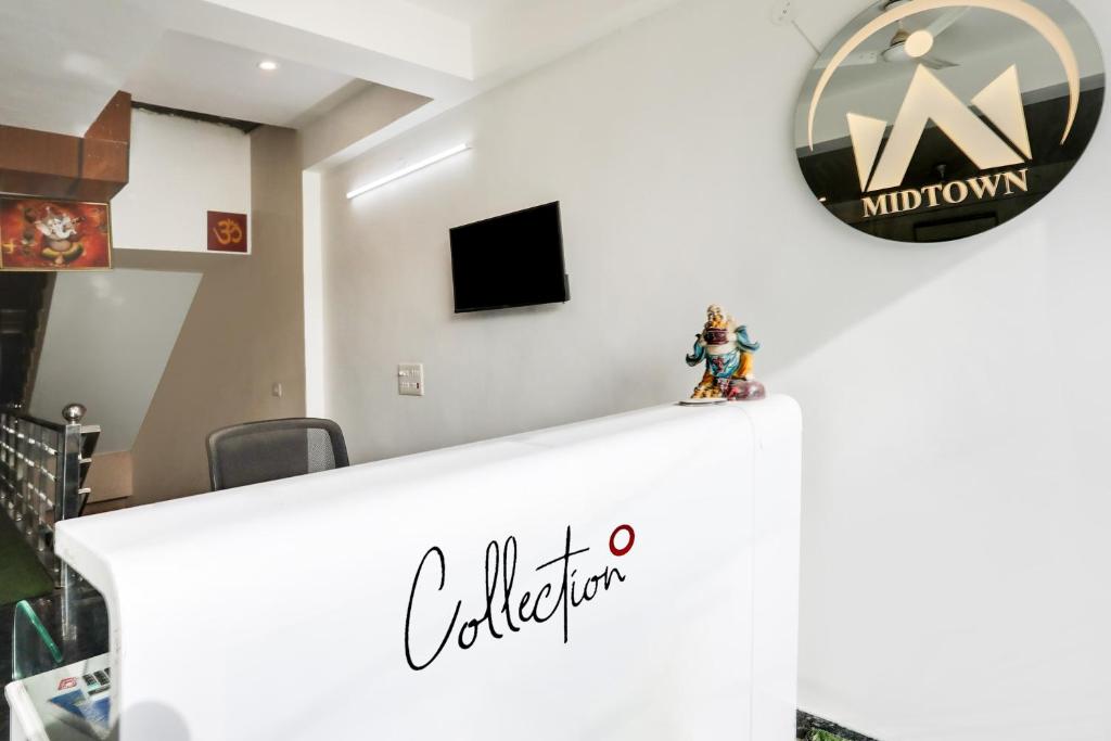 TV a/nebo společenská místnost v ubytování Hotel Midtown