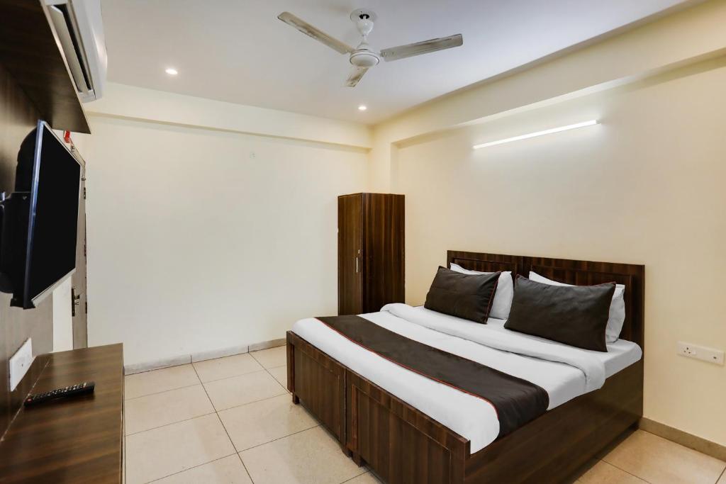 Postel nebo postele na pokoji v ubytování Hotel Midtown