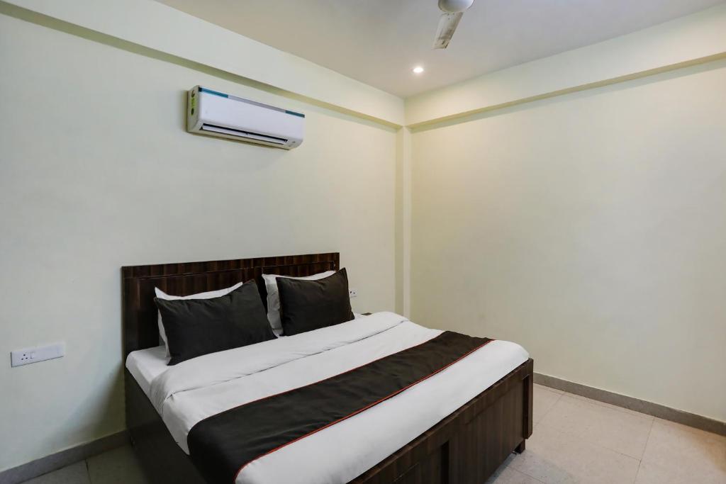 Postel nebo postele na pokoji v ubytování Hotel Midtown