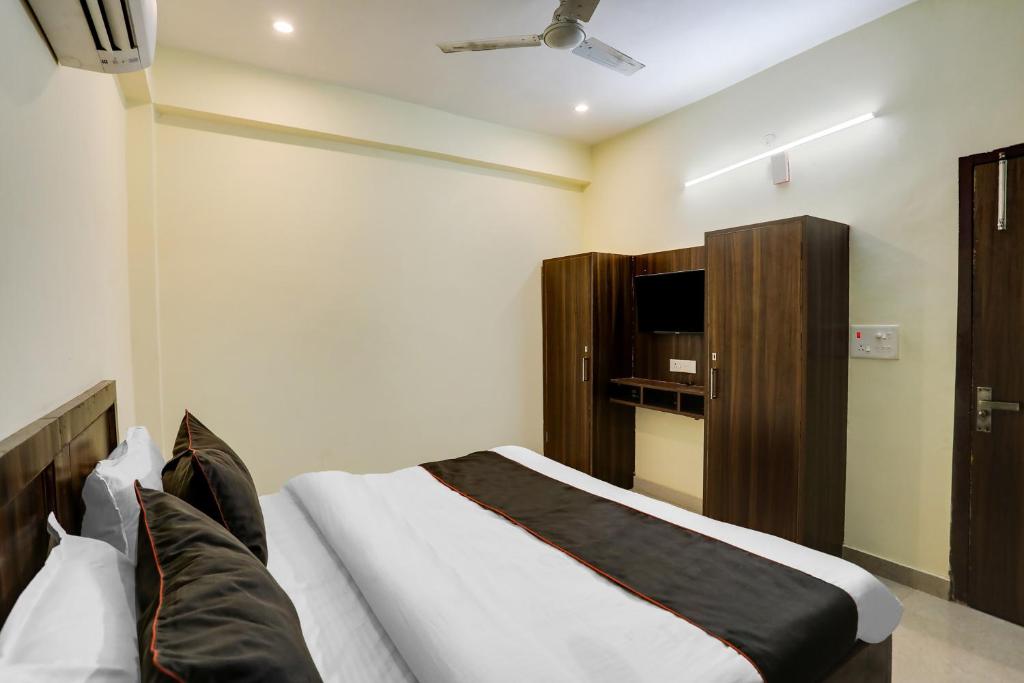 Postel nebo postele na pokoji v ubytování Hotel Midtown