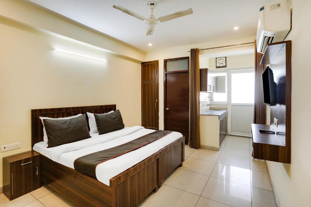Postel nebo postele na pokoji v ubytování Hotel Midtown