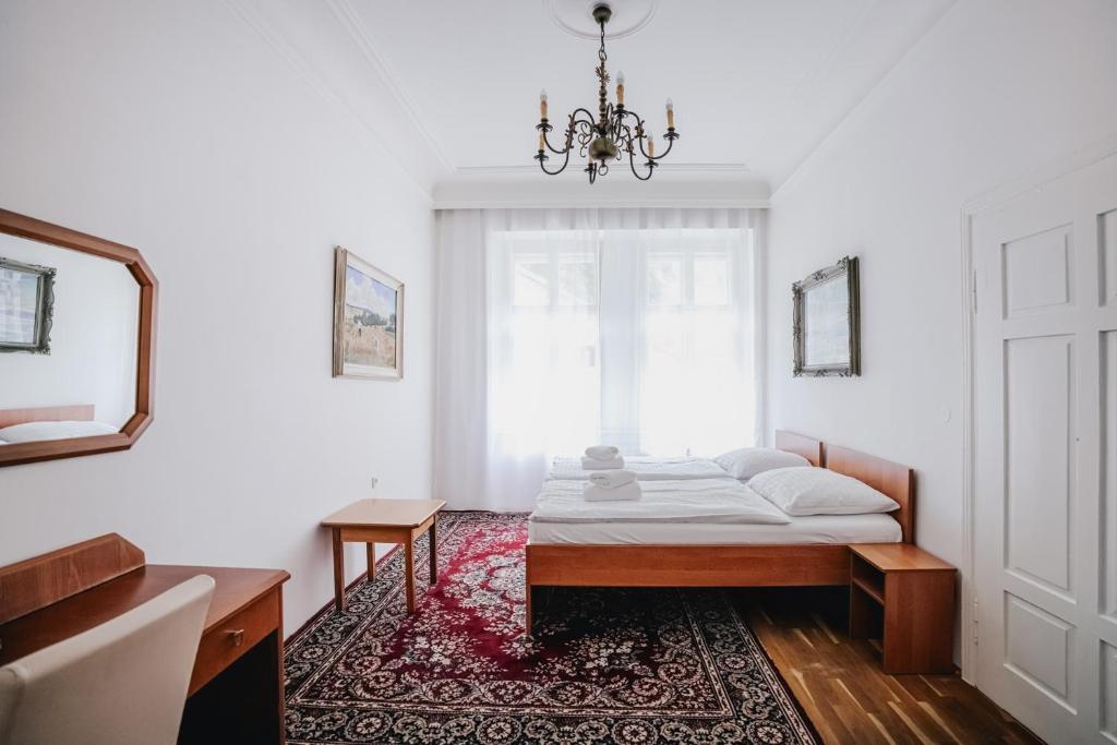 Postel nebo postele na pokoji v ubytování Hotel Šipka