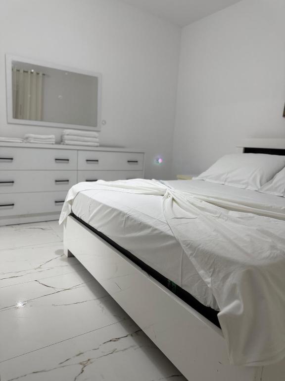 Postel nebo postele na pokoji v ubytování Fabio Rent House