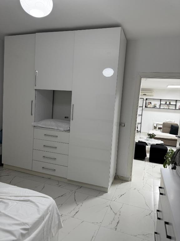 Postel nebo postele na pokoji v ubytování Fabio Rent House