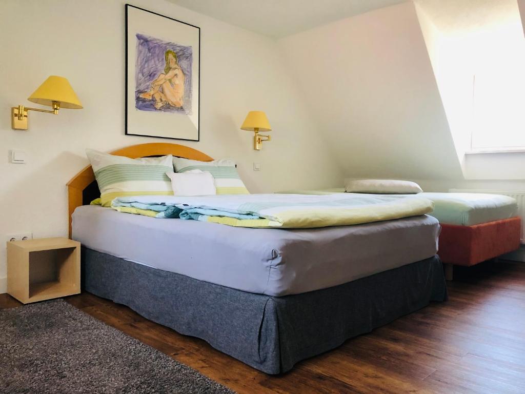 Postel nebo postele na pokoji v ubytování Idas Garten