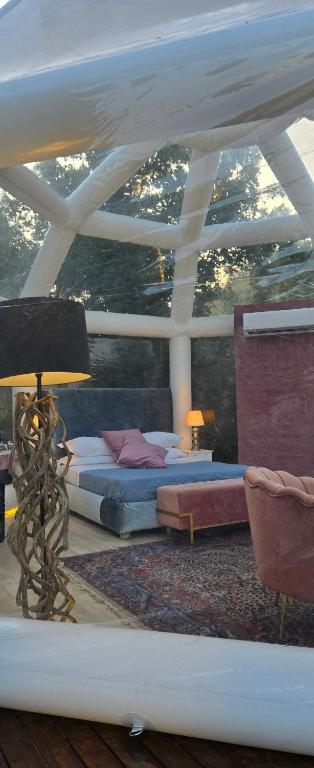 Posteľ alebo postele v izbe v ubytovaní Bubble Glamping Sicily