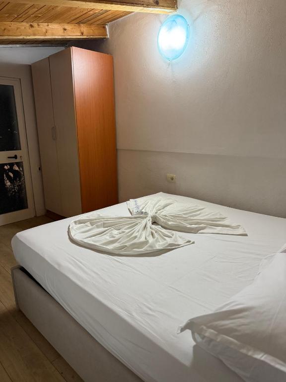 Postel nebo postele na pokoji v ubytování Fabio Rent House