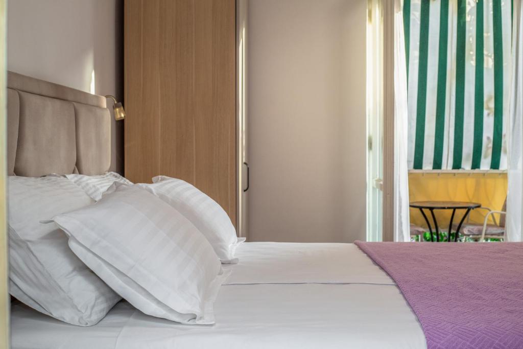 Postel nebo postele na pokoji v ubytování Rooms Ivka