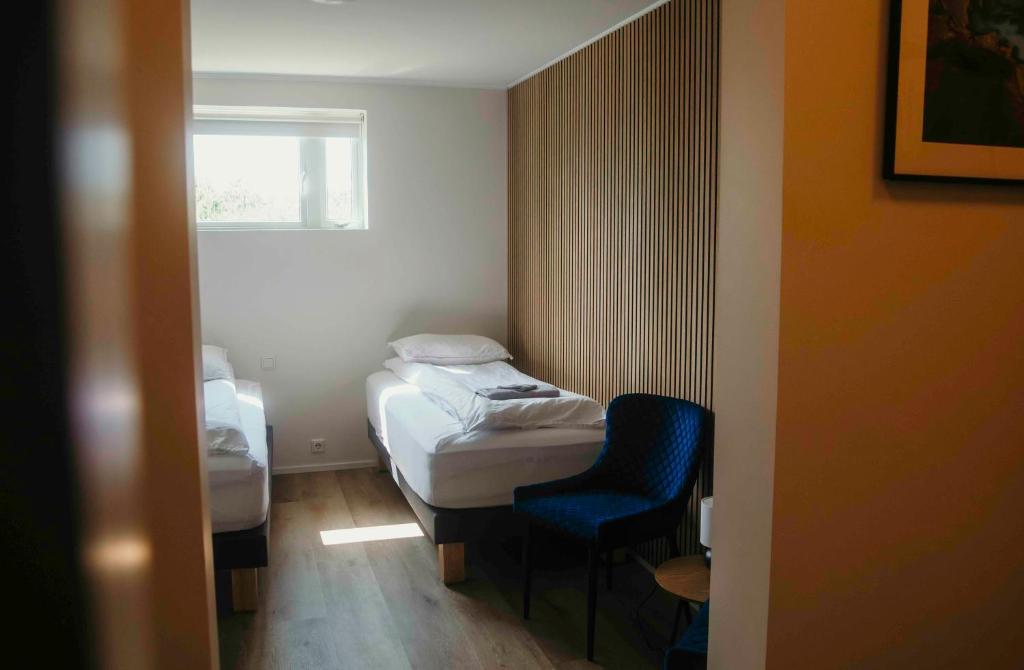 Postel nebo postele na pokoji v ubytování The Hvítá Inn by Ourhotels