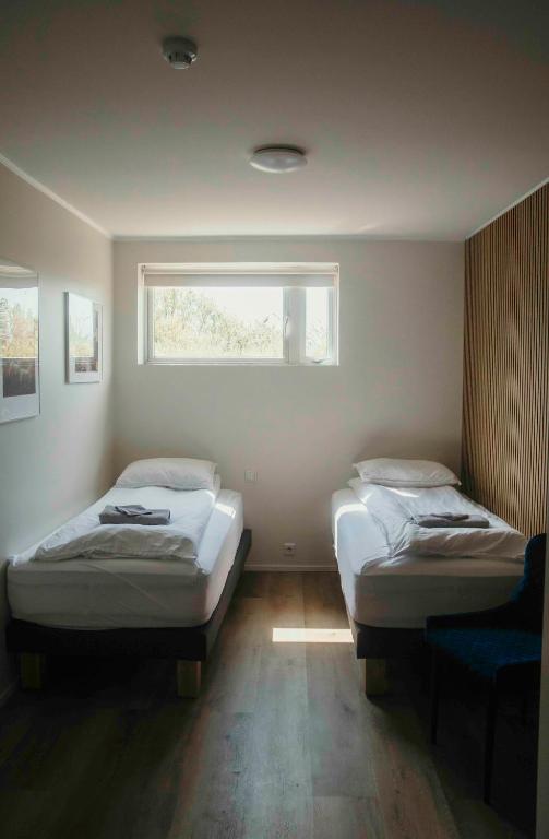 Postel nebo postele na pokoji v ubytování The Hvítá Inn by Ourhotels