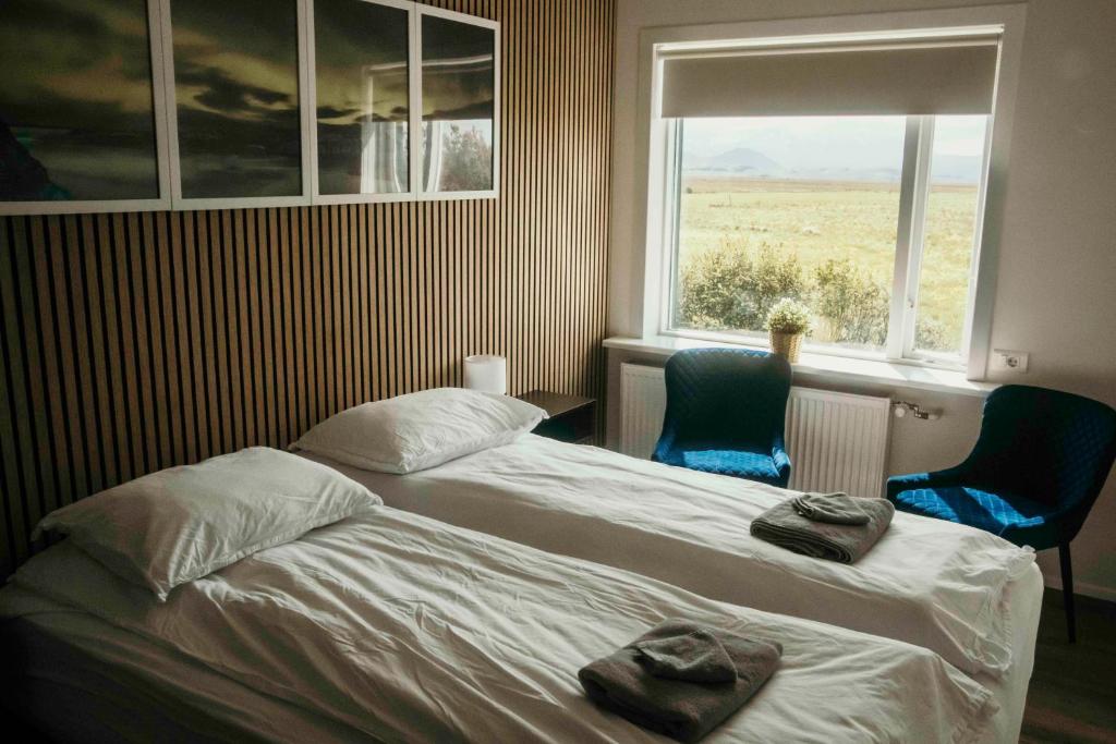 Postel nebo postele na pokoji v ubytování The Hvítá Inn by Ourhotels