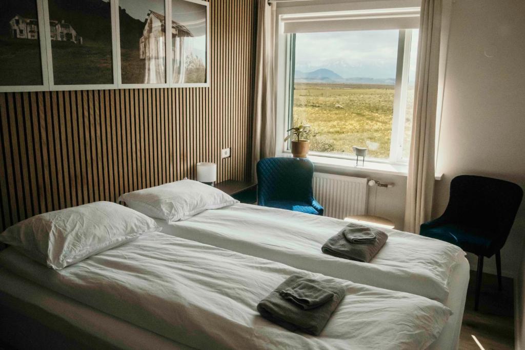 Postel nebo postele na pokoji v ubytování The Hvítá Inn by Ourhotels