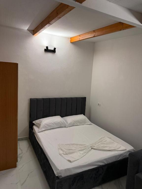 Postel nebo postele na pokoji v ubytování Fabio Rent House