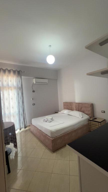 Postel nebo postele na pokoji v ubytování Hotel Villa Flowers 2