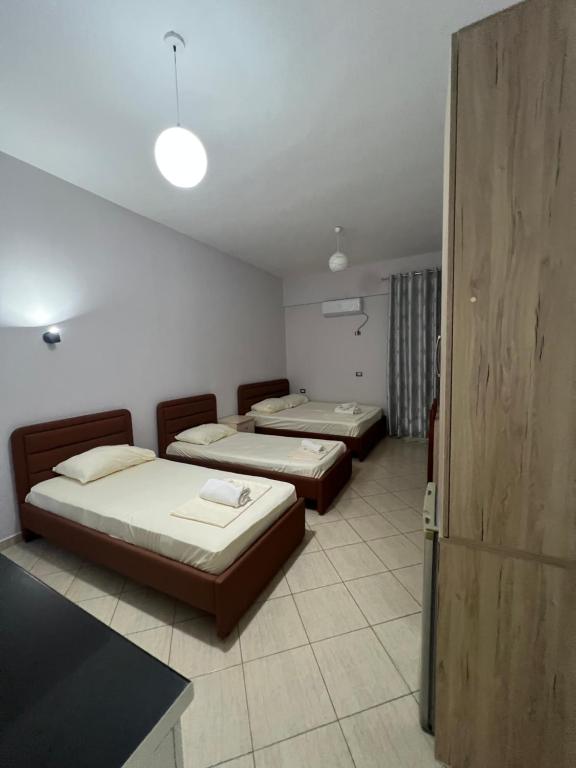 Postel nebo postele na pokoji v ubytování Hotel Villa Flowers 2