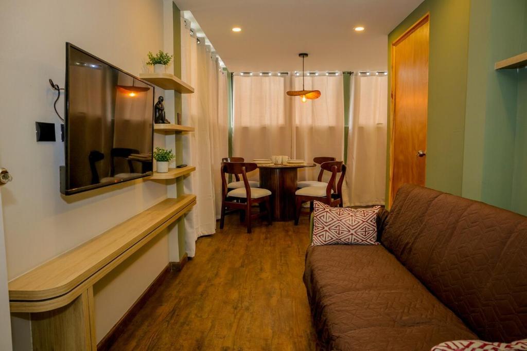 TV a/nebo společenská místnost v ubytování Apartamento con encanto y diseño